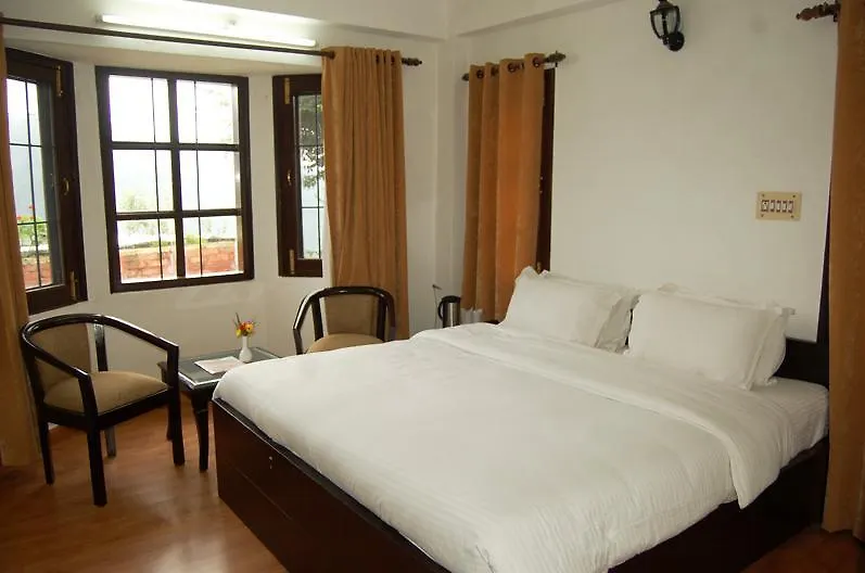 מלון משוברה Manla Homes Resort